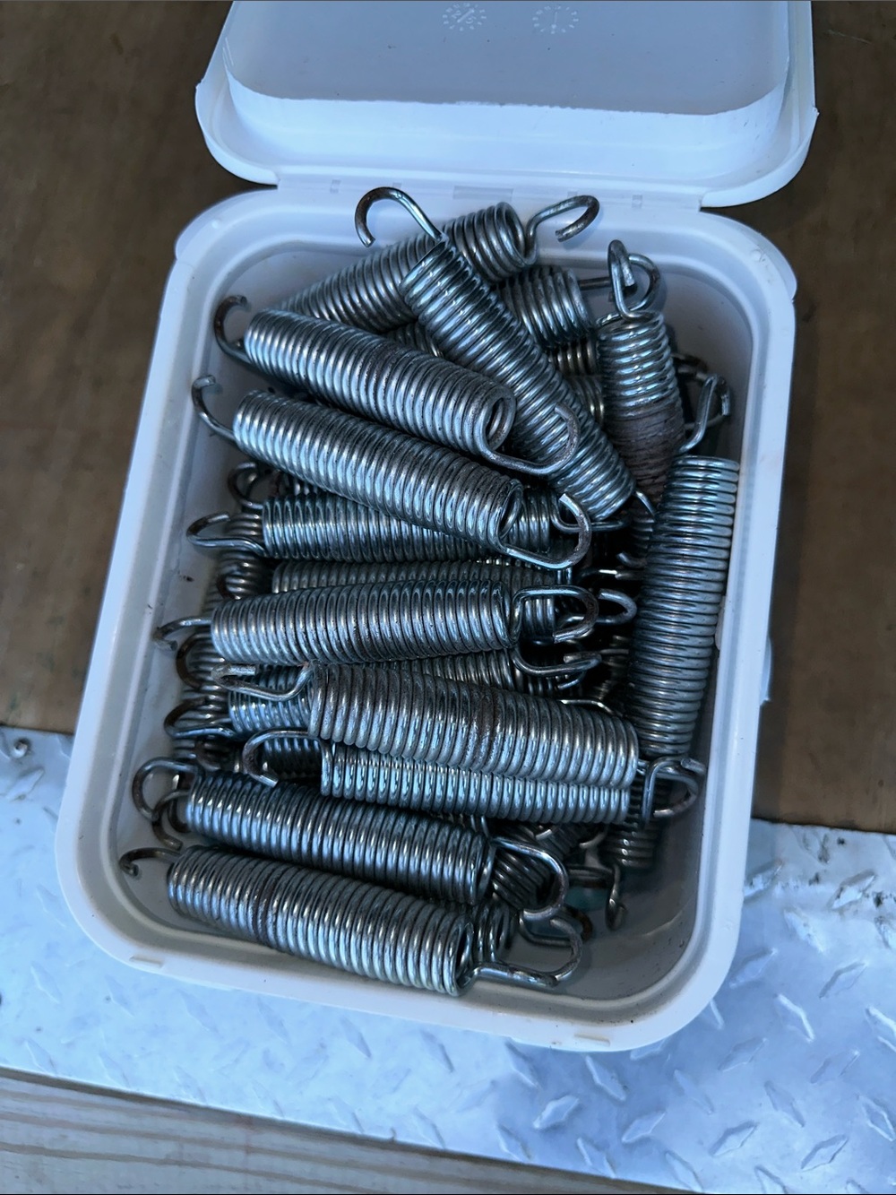 Fifteen 5 1/2” replacement galvanized steel trampoline springs